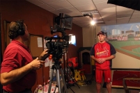 Mike Haller videotaping Cardinals Lance Berkman 1